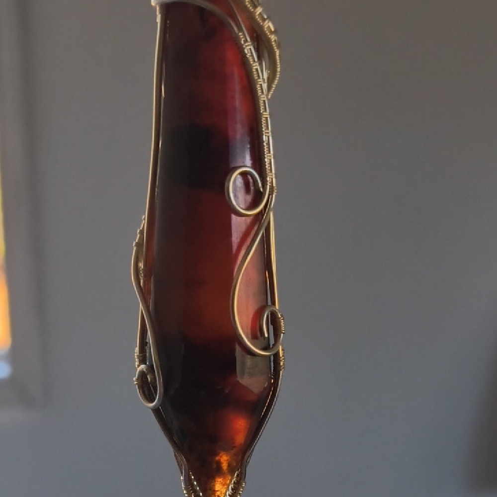 Elegant Gold and Black Wire-Wrapped Pendant - Picture 3 of 5